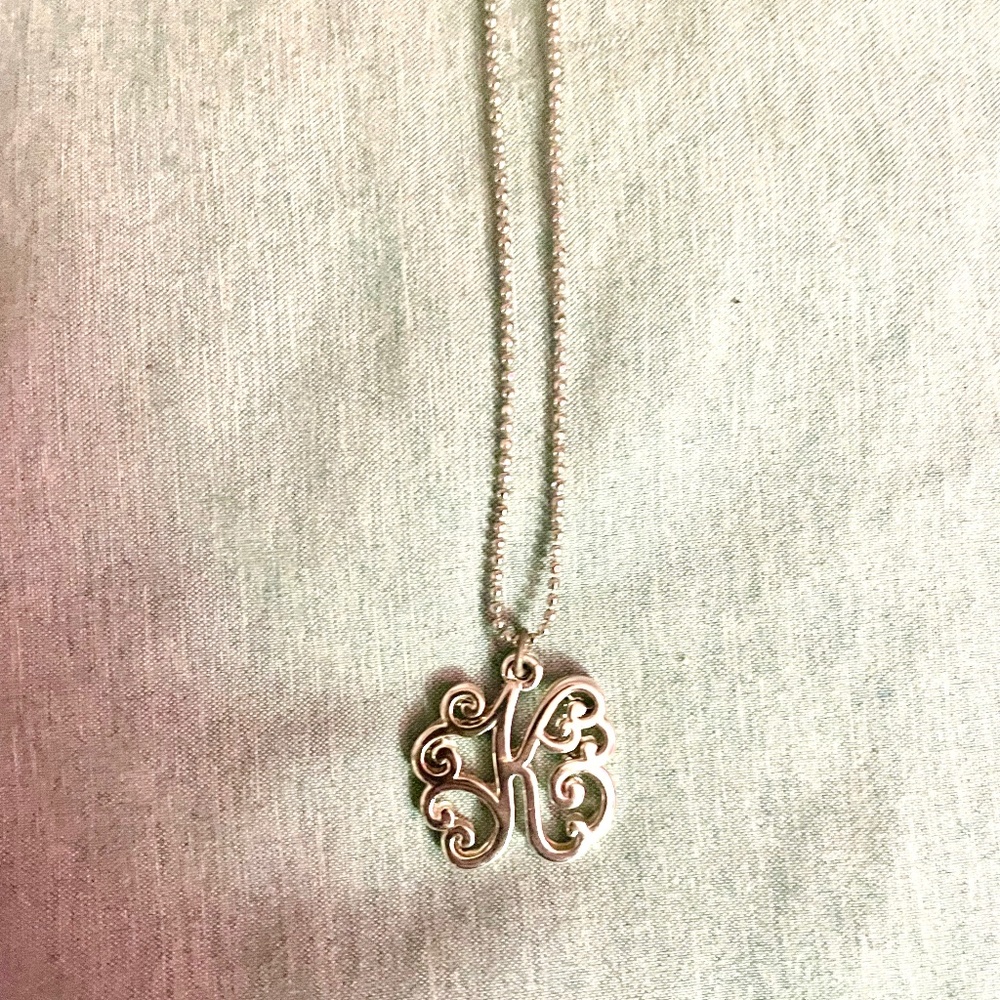 K charm necklace. Silver. Calligraphy script. Monogram.